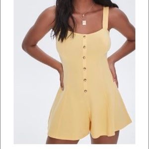 NWT. Yellow romper size medium